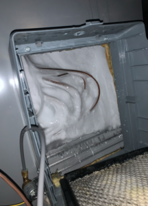 a frozen coil can cause the ac to not cool enough and it will leak water