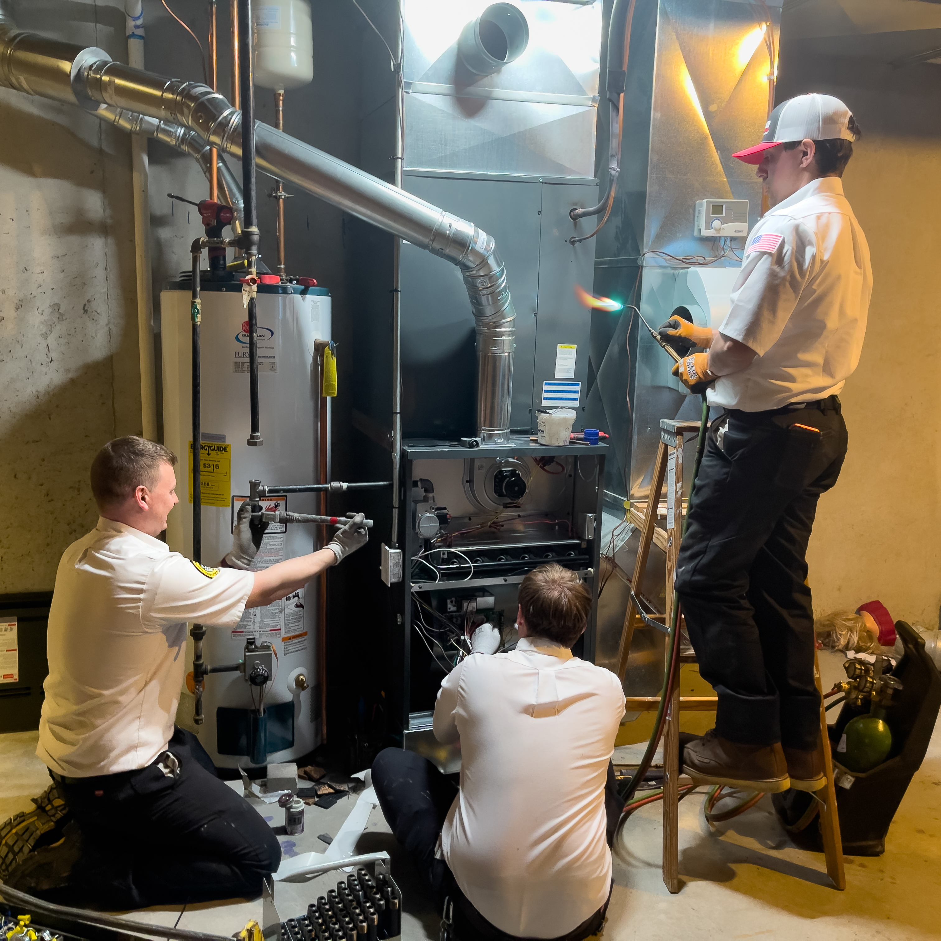 A professional HVAC technician inspecting a furnace during a routine maintenance check